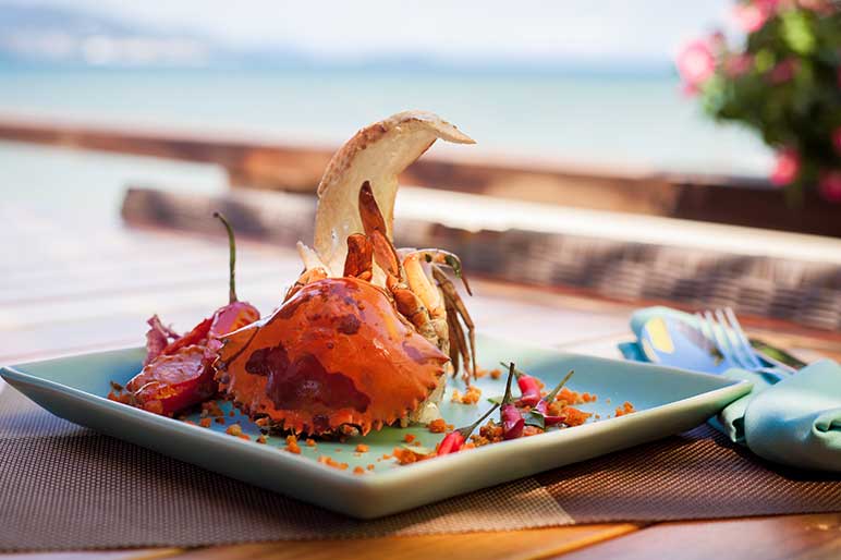 Fried sea crab served with lettuce